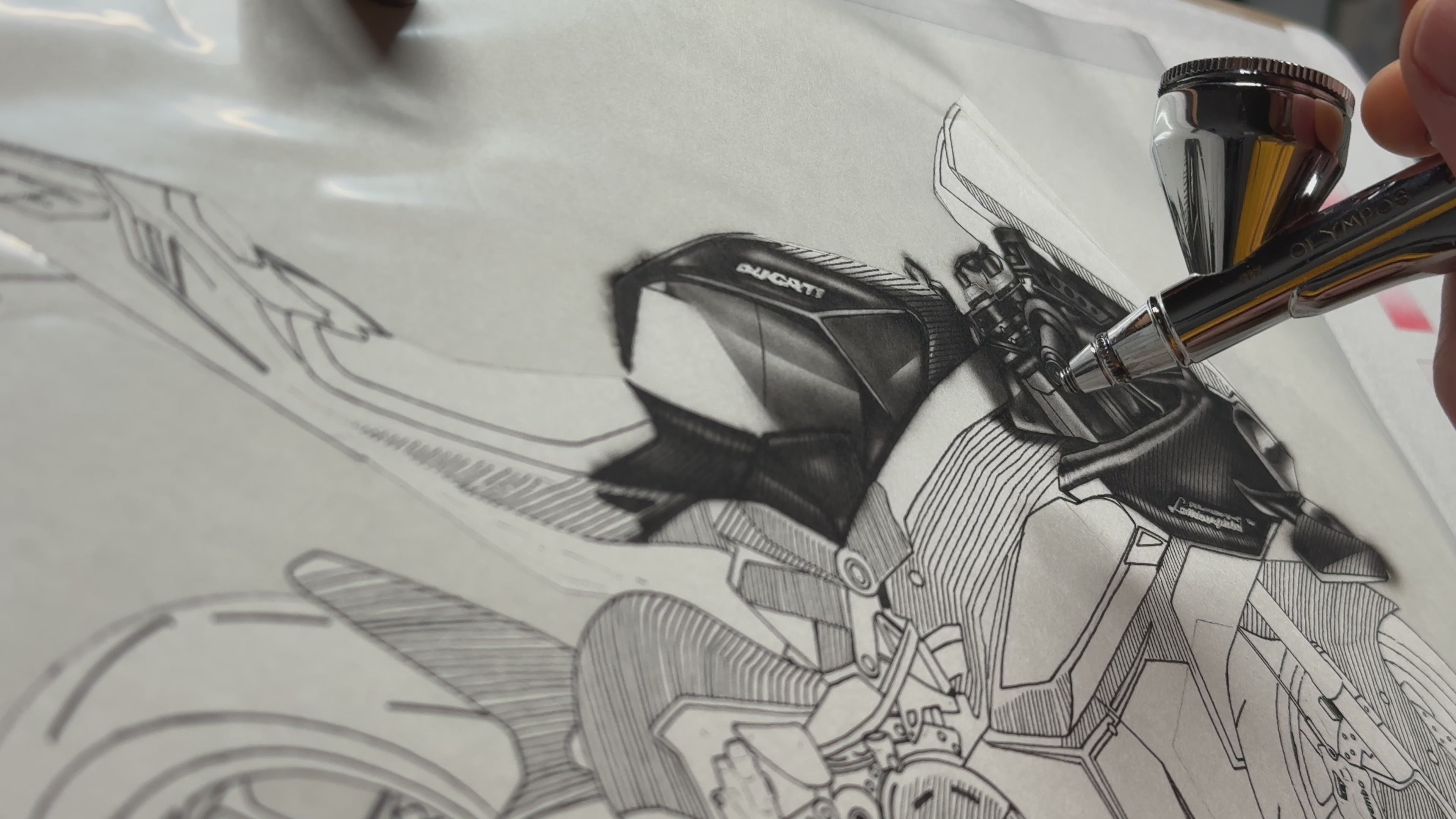 カワサキのバイクイラストをエアーブラシで描いている動画